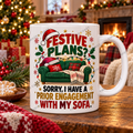Watermarked Christmas mug mockup: Festive plans? Sofa